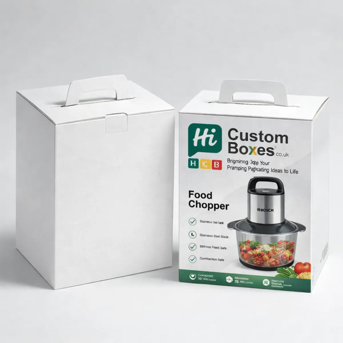 Two white appliance boxes with carry handles, one plain and one featuring a Bosch-style chopper. class=